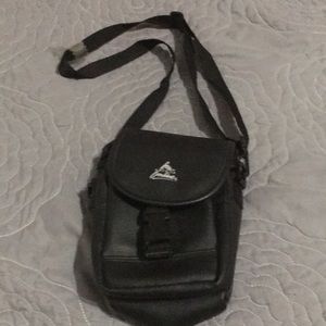 Stylish bag with zipper pouch and draw string.